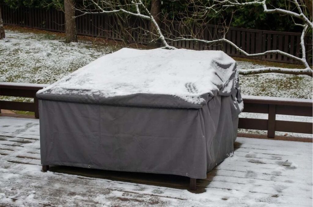 4. outdoor furniture covered in winter