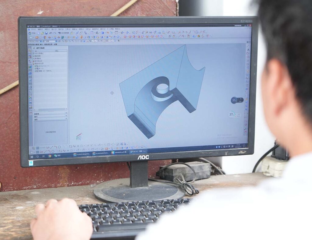 Engineer is drawing 3D visualization for plastic accessory